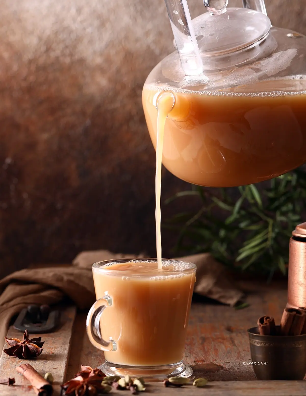 Karak chai pouring