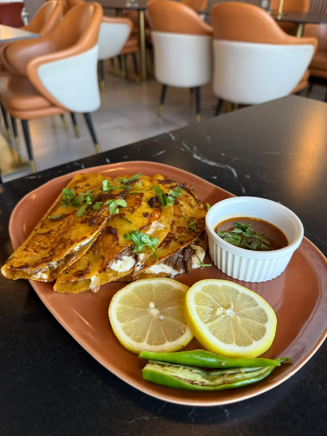 Nihari Tacos at Armila's – slow-cooked nihari and melted cheese in a crisp golden shell